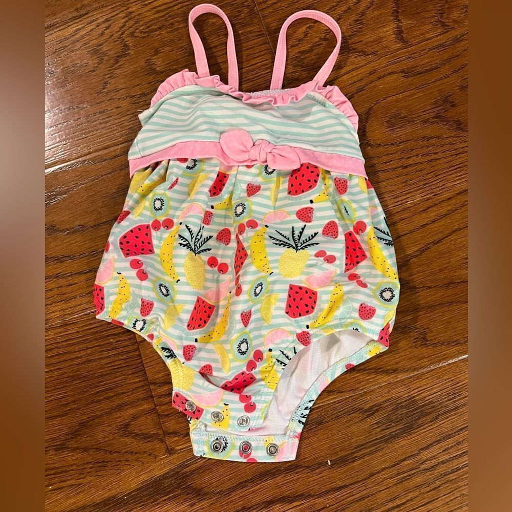 Target 6-9 mos. Baby girl bathing suit with fruit on it